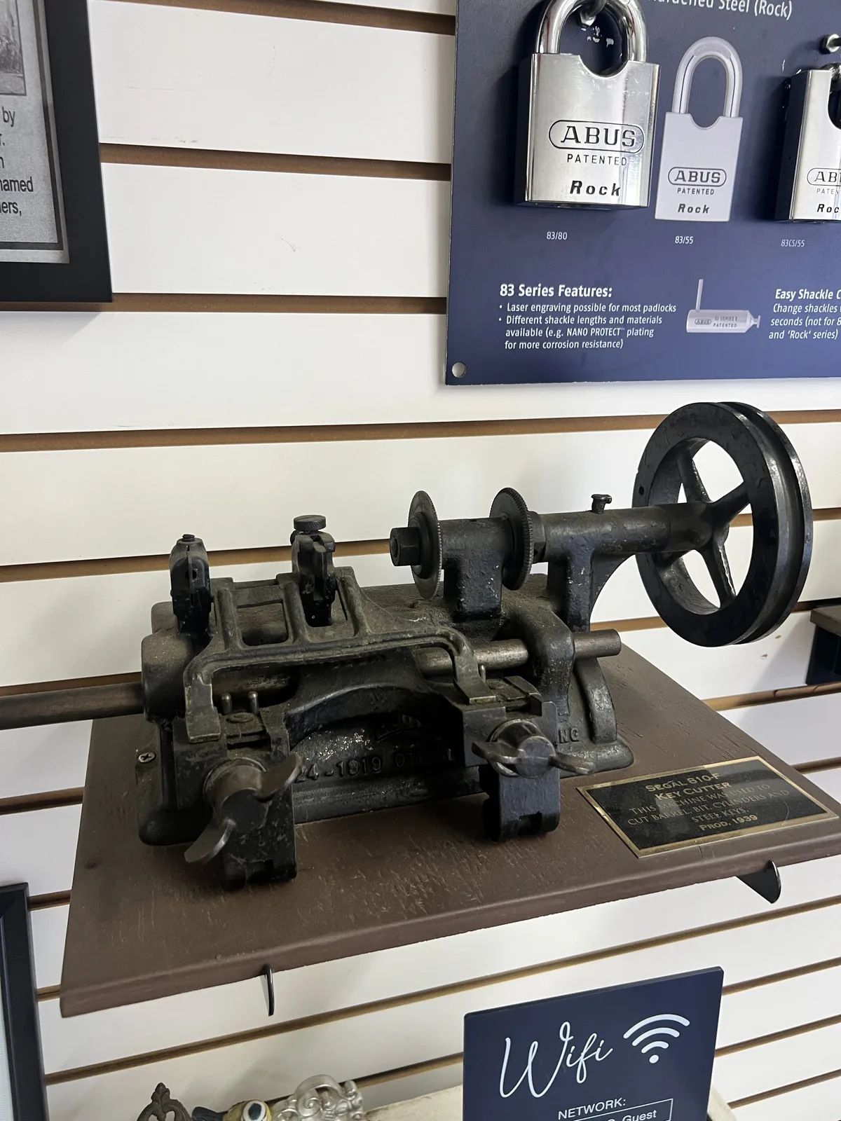 Antique key cutting machine on display at Abe's Lock and Key