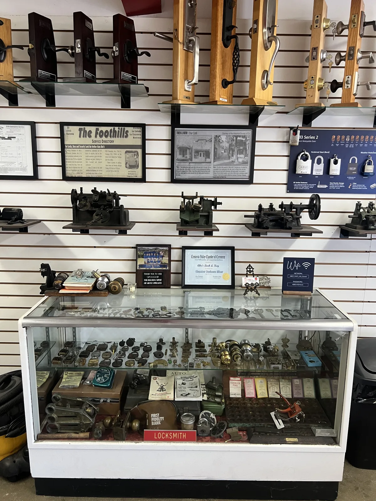 Display case of antique locks and locksmith history at Abe's Lock and Key